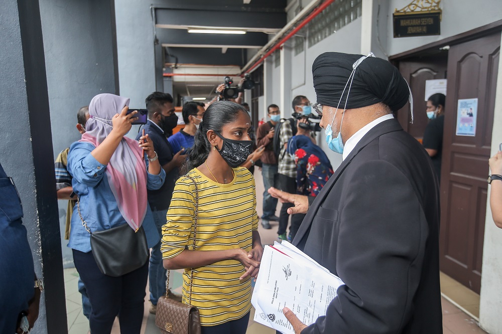 Malaysian YouTube sensation S. Pavithra is seen at the Magistrate Court in Ipoh as her husband M. Sugu claims trial to possession of an offensive weapon in a public place, July 24, 2020. u00e2u20acu201d Picture by Farhan Najib