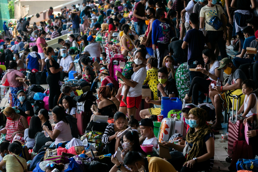 Filipinos stranded due to the coronavirus disease (COVID-19) restrictions are crammed inside a baseball stadium in Rizal Memorial Sports Complex, Manila, Philippines, July 25, 2020. u00e2u20acu201d Reuters pic