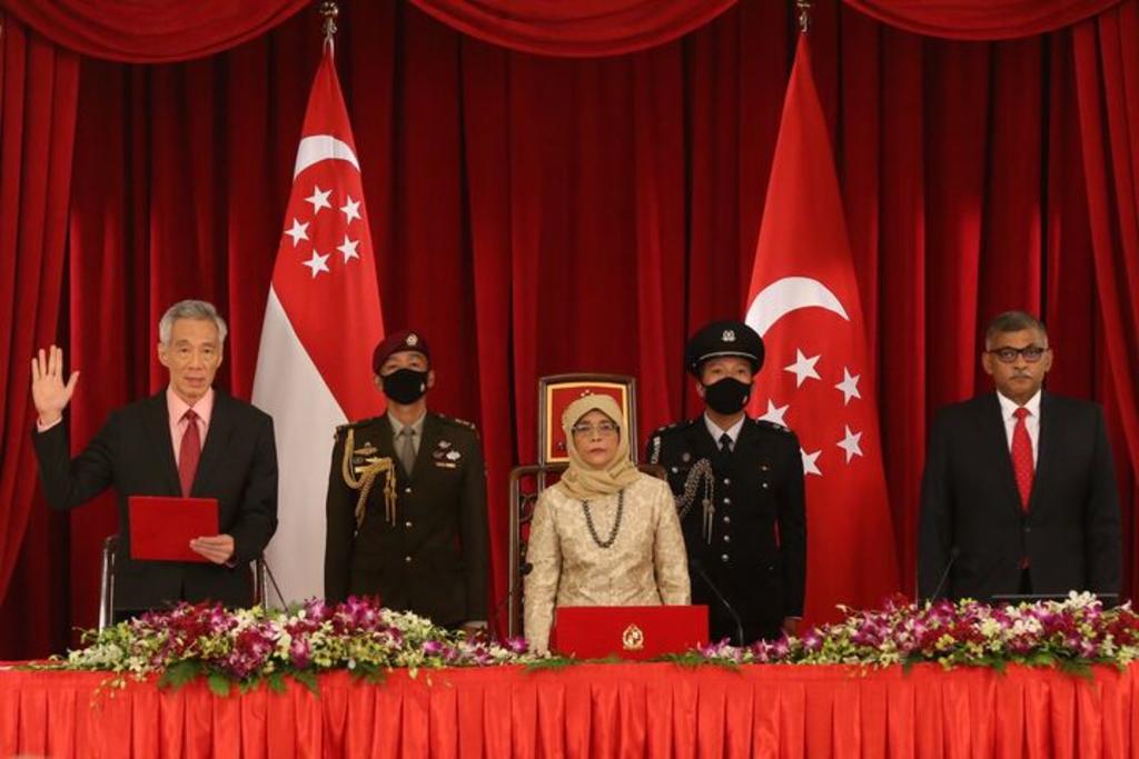 Prime Minister Lee Hsien Loong (left), President Halimah Yacob (centre) and Chief Justice Sundaresh Menon (right) at the swearing in of the new Cabinet on July 27, 2020. u00e2u20acu201d TODAY pic