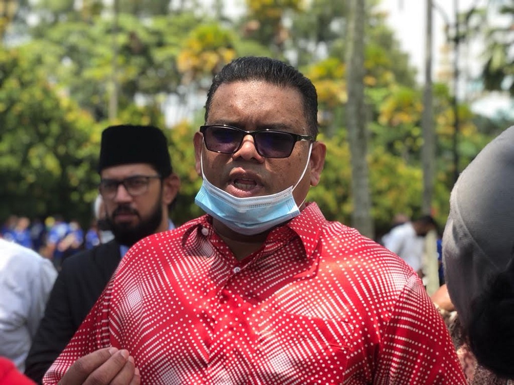 Datuk Lokman Adam speaks to Malay Mail outside the court house in Kuala Lumpur July 28, 2020. — Picture by Emmanuel Santa Maria Chin
