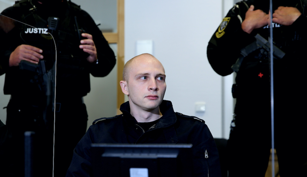 Stephan B., who is accused of shooting two people after an attempt to storm a synagogue in Halle, waits for the start of the second day of his trial, in Magdeburg, Germany July 22, 2020. u00e2u20acu201d Ronny Hartmann/Pool via Reuters