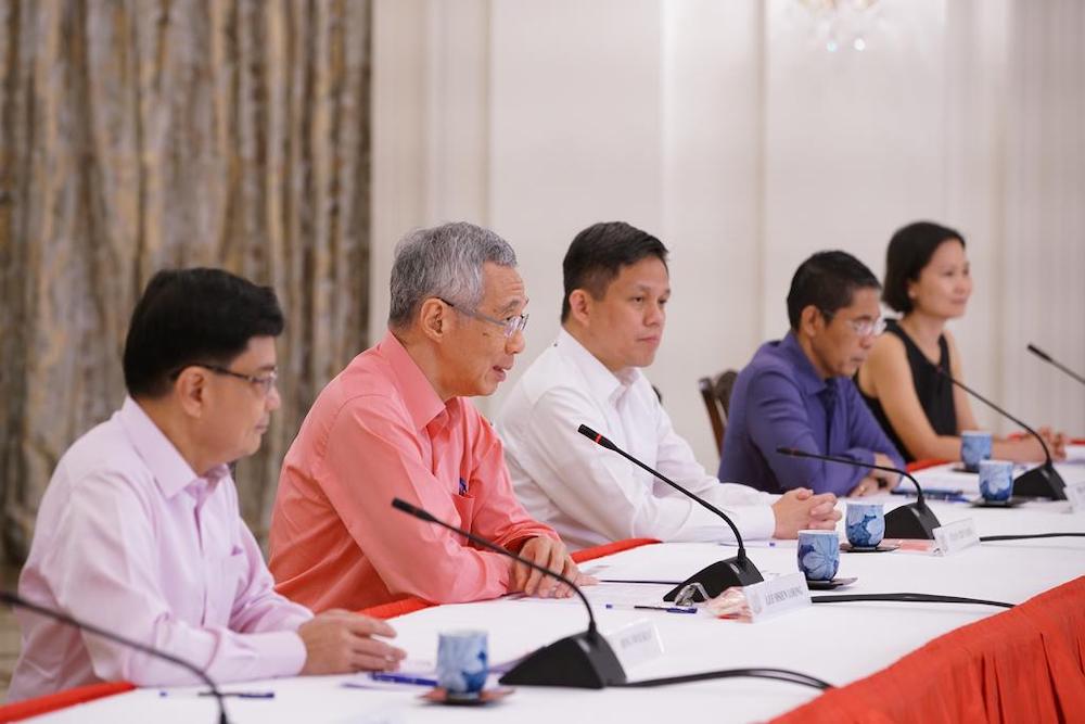 (from left): Singapore Prime Minister Lee Hsien Loong at the media briefing on the Cabinet reshuffle, July 25, 2020. u00e2u20acu201d Picture courtesy of Ministry of Communication and Information via TODAY