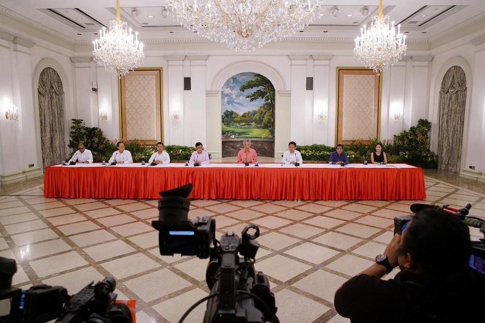 Prime Minister Lee Hsien Loong and political office holders during the briefing to unveil the latest Cabinet on July 25, 2020. u00e2u20acu201d Picture courtesy of Ministry of Communication and Information via TODAY