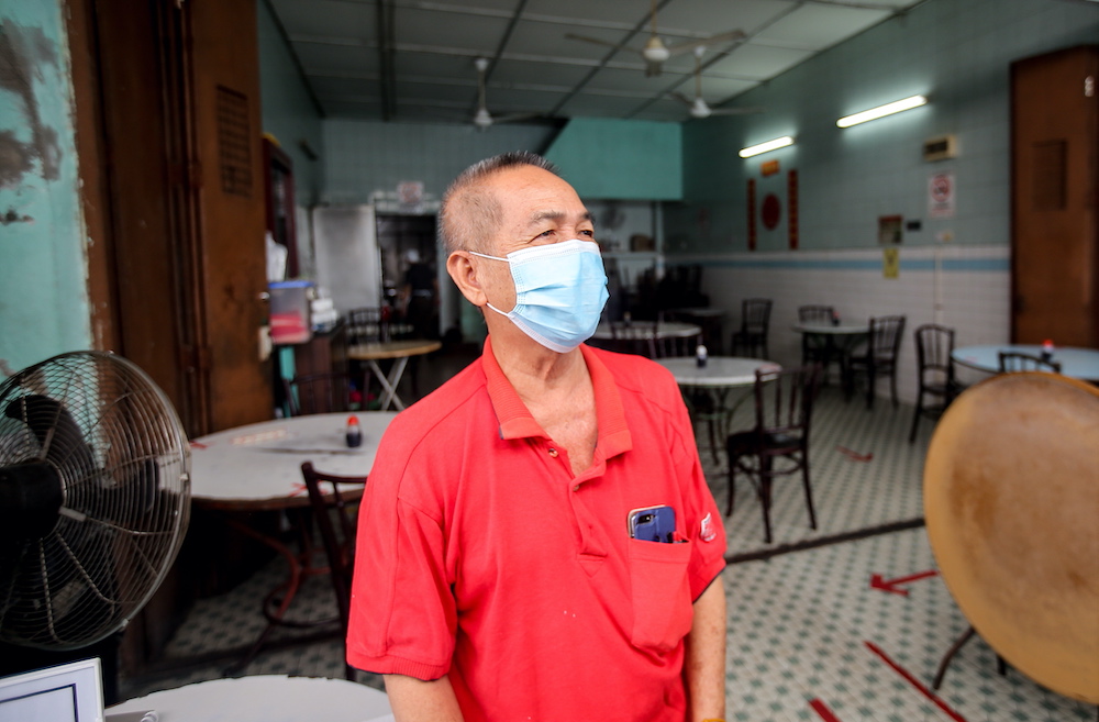 Ooi, 69, from Wong Koh Kee restaurant located in Concubine Lane in Ipoh said patrons are gradually returning to the shop. — Picture by Farhan Najib