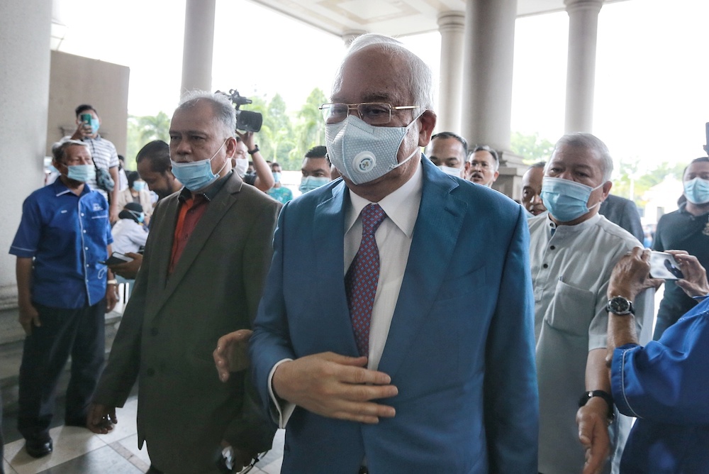 Datuk Seri Najib Razak arrives at the Kuala Lumpur High Court, July 27, 2020. u00e2u20acu201d Picture by Ahmad Zamzahuri