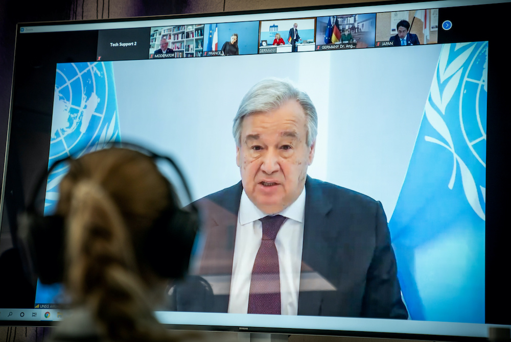 United Nations Secretary-General Antonio Guterres is seen on a video screen during a virtual climate summit, known as the Petersberg Climate Dialogue, in Berlin on April 28, 2020. u00e2u20acu201d Reuters pic