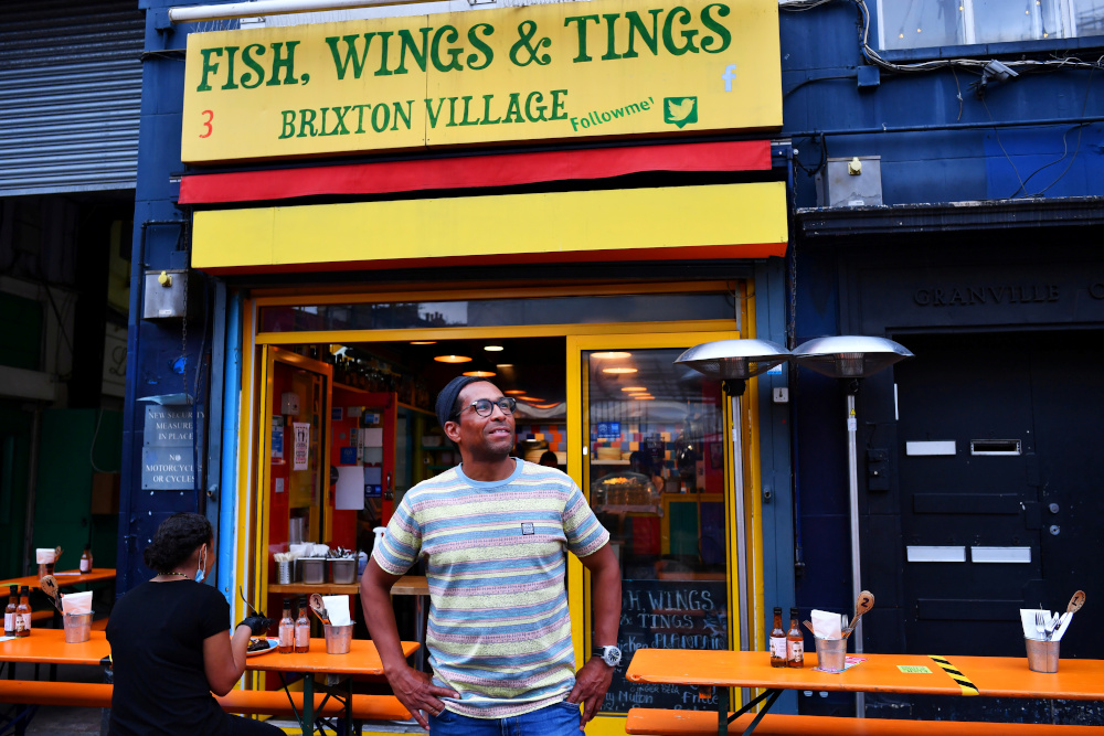 Brian Danclair, owner of Fish, Wings and Tings, stands outside his restaurant at Brixton Village, as the outbreak of the coronavirus disease continues to affect businesses, in London, Britain July 14, 2020. u00e2u20acu201d Reuters pic 