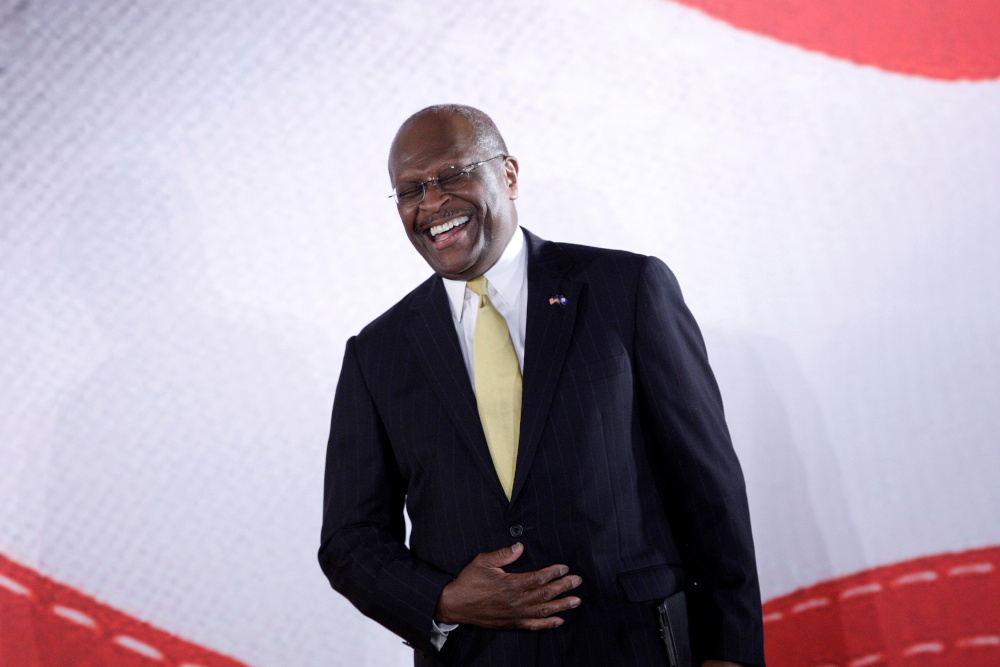 Former Republican presidential candidate Herman Cain laughs onstage after addressing the Faith & Freedom Coalition Road to Majority Conference in Washington, US, June 15, 2013. u00e2u20acu201d Reuters pic 