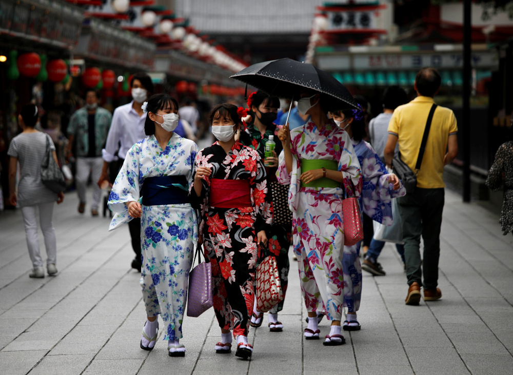 Women in yukata, or casual summer kimonos, walk along Nakamise Street at Asakusa district, a popular sightseeing spot, amid the coronavirus disease outbreak in Tokyo, Japan July 22, 2020. u00e2u20acu201d Reuters pic 