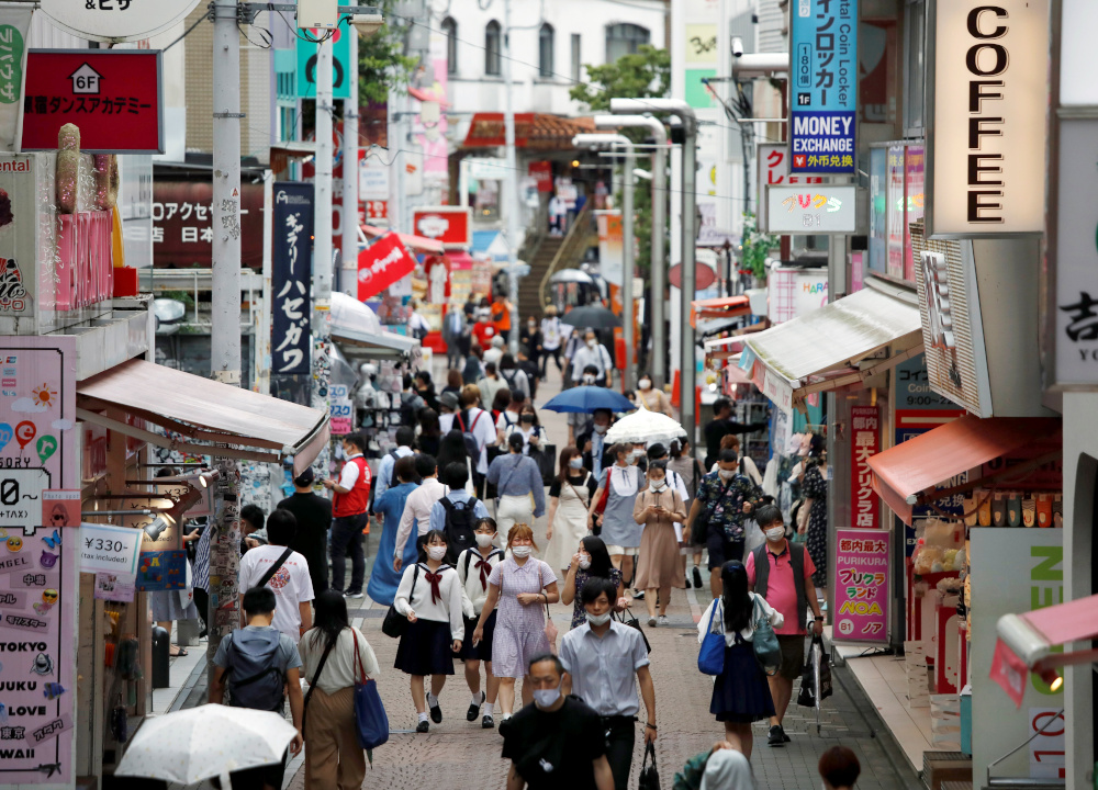 Passersby wearing protective face masks are seen at Takeshita Street, a popular sightseeing spot amid the coronavirus disease outbreak in Tokyo, Japan July 29, 2020. u00e2u20acu201d Reuters pic 