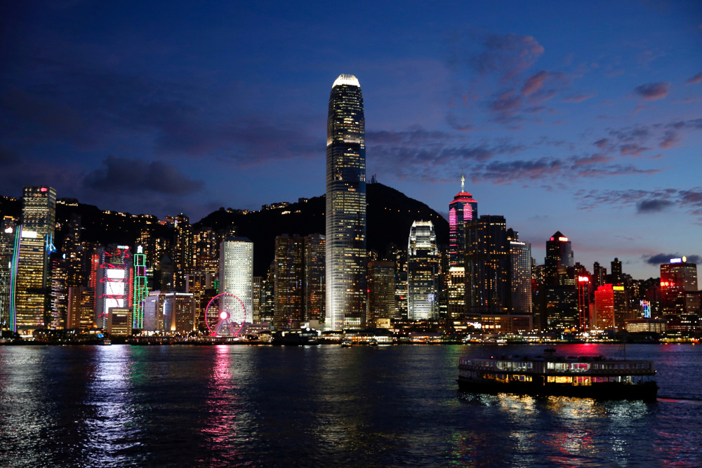 A Star Ferry boat crosses Victoria Harbour in front of a skyline of buildings during sunset, as a meeting on national security legislation takes place in Hong Kong, China June 29, 2020. u00e2u20acu201d Reuters pic 