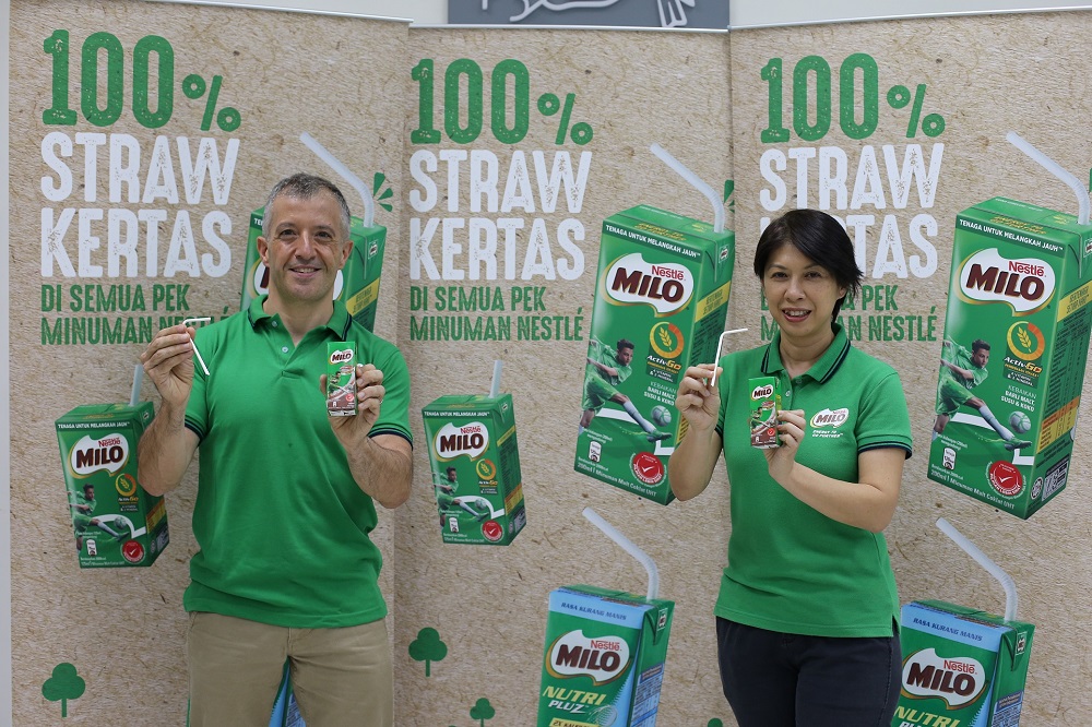 April Wong (right) and Chief Executive Officer Juan Aranols (left) presenting drink packs with paper straws, to be rolled out across Nestlu00c3u00a9 Malaysia's entire UHT range by end-2020. u00e2u20acu2022 Picture courtesy of Nestle Malaysia Berhad