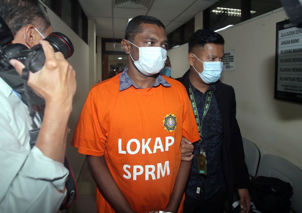 R. Lingeswaran arrives at the Ipoh Sessions Court July 20, 2020. u00e2u20acu201d Picture by Farhan Najib