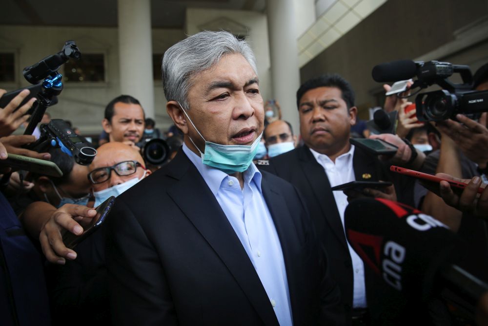 Umno president Datuk Seri Dr Ahmad Zahid Hamidi speaks to reporters at the Kuala Lumpur High Court July 28, 2020. u00e2u20acu2022 Picture by Yusof Mat Isa