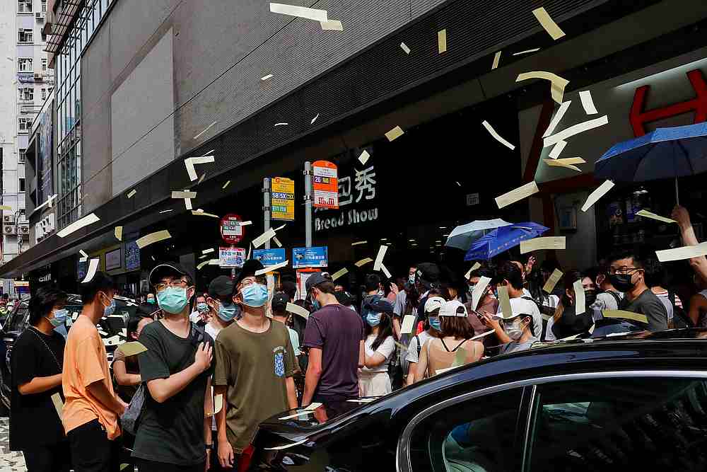 Anti-national security law protesters throw mock paper money during a march against national security law at the anniversary of Hong Kong's handover to China from Britain, in Hong Kong July 1, 2020. u00e2u20acu201d Reuters pic