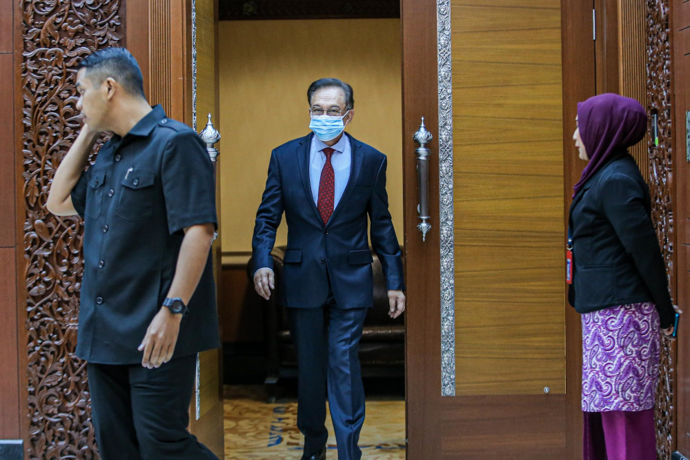 Port Dickson MP Datuk Seri Anwar Ibrahim is pictured during the second meeting of the third session of the 14th Parliament in Kuala Lumpur July 13, 2020. u00e2u20acu201d Picture by Hari Anggara