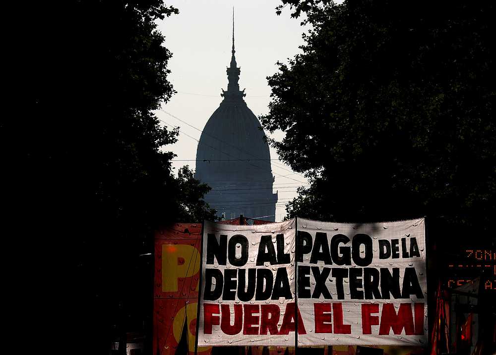 Demonstrators hold a banner that reads 'no to foreign debt payment, IMF out' as they march towards Casa Rosada Presidential Palace in Buenos Aires, Argentina February 12, 2020. u00e2u20acu201d Reuters pic