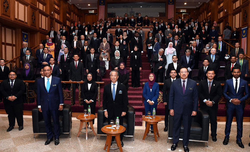 Prime Minister Tan Sri Muhyiddin Yassin poses with ministers and the recipients of this yearu00e2u20acu2122s Perdana Fellows programme in Putrajaya July 8, 2020. u00e2u20acu201d Bernama
