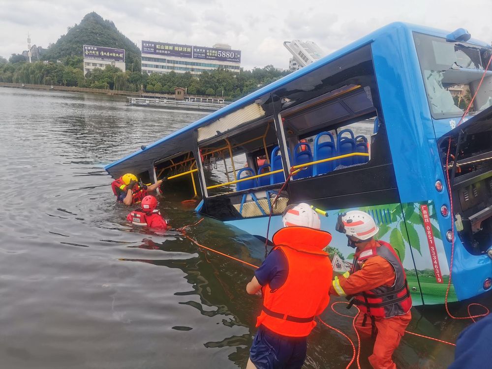 Rescue workers are seen at the site where a bus carrying students plunged into a reservoir, in Anshun, Guizhou province, China July 7, 2020. u00e2u20acu201dChina Daily via Reuters