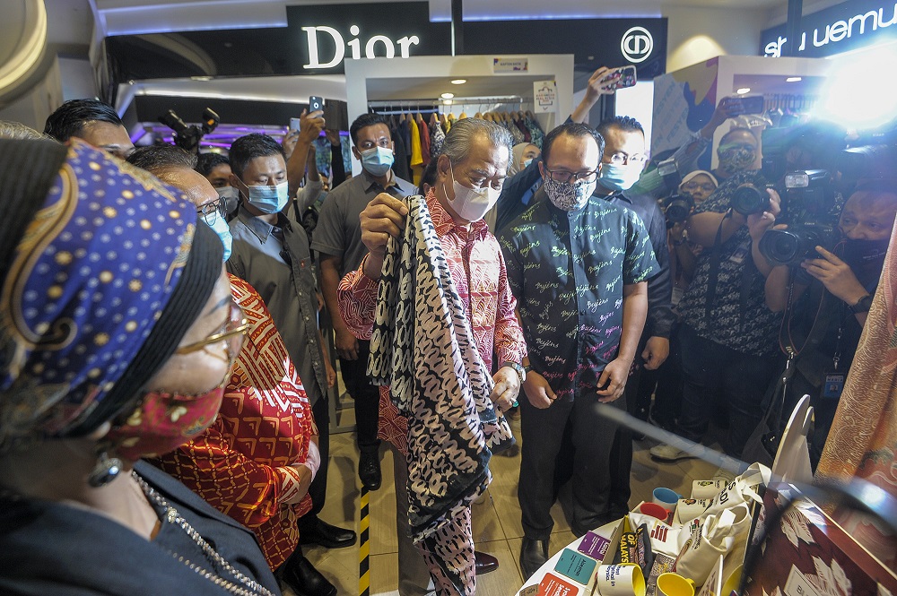 Prime Minister Tan Sri Muhyiddin Yassin visits booths selling local products during national-level Mega Sales Programme and Buy Malaysian Products Campaign at Suria KLCC in Kuala Lumpur July 18, 2020. u00e2u20acu2022 Picture by Shafwan Zaidon
