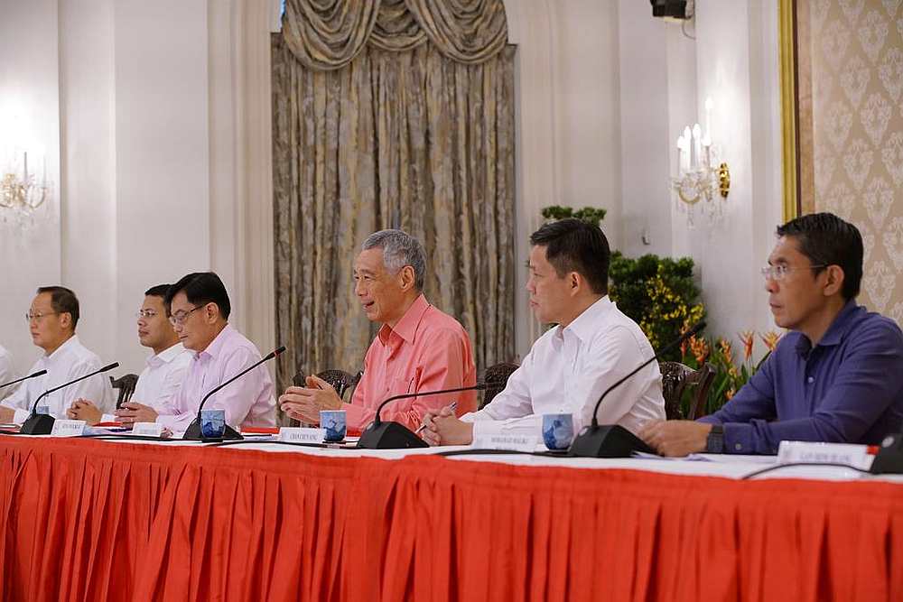 Singapore Prime Minister Lee Hsien Loong (centre) and political office holders during the unveiling of the latest cabinet on July 25, 2020). u00e2u20acu201d Picture courtesy of Singapore Ministry of Communications and Information via TODAY