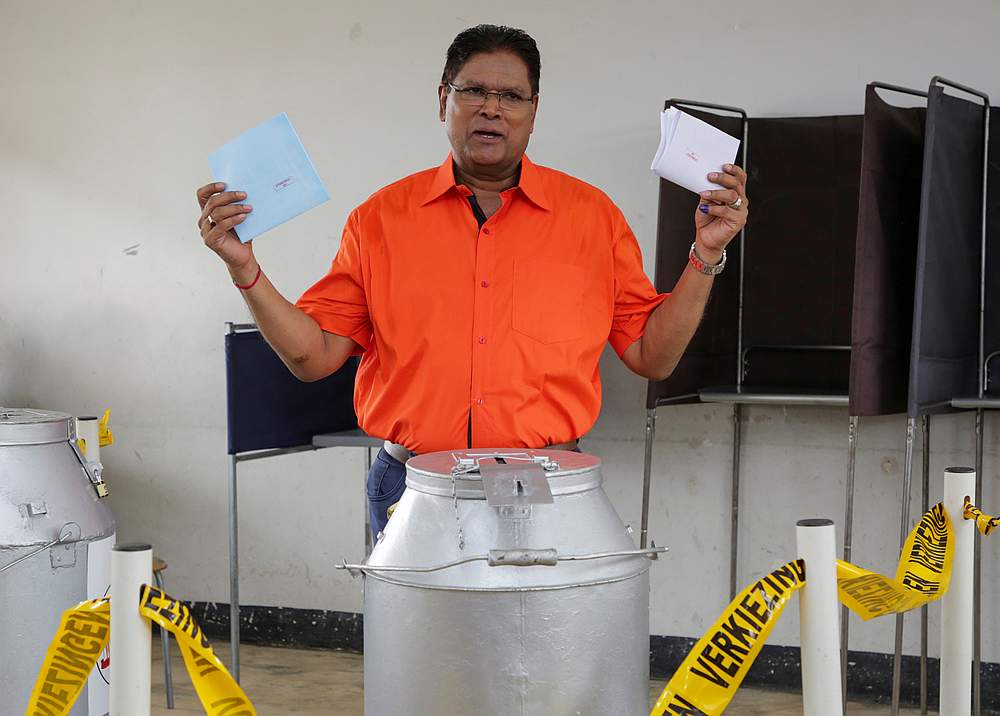 Former police commissioner Chan Santokhi of the Progressive Reform Party gestures while casting his vote during parliamentary elections, in Paramaribo, Suriname May 25, 2020. u00e2u20acu201d Reuters pic 