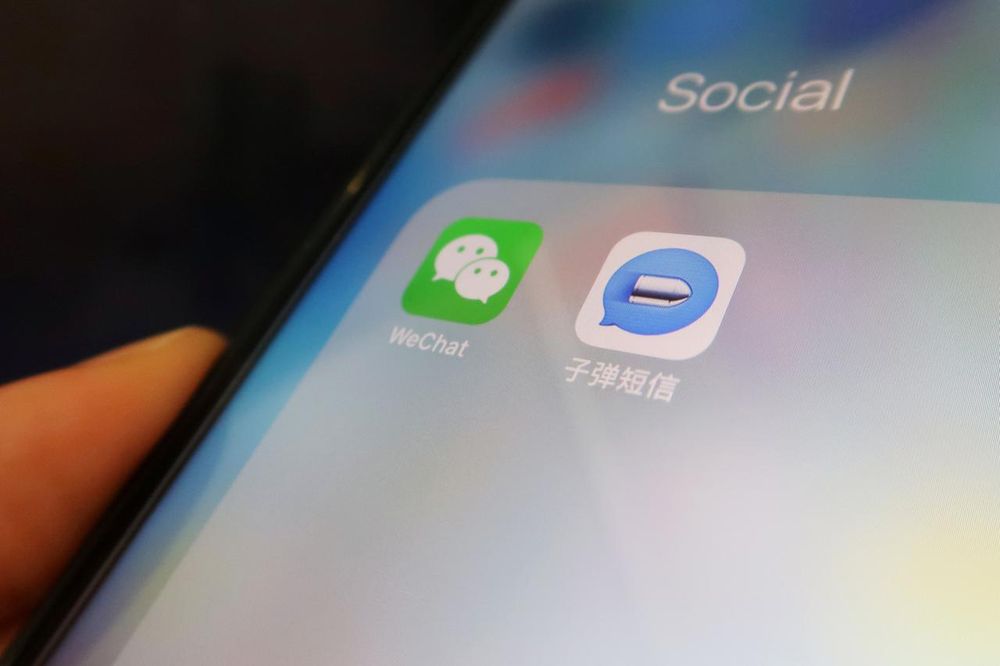Chinese instant messaging app Bullet Messenger is seen next to Tencentu00e2u20acu2122s Wechat app on a mobile phone in this illustration picture taken September 4, 2018. u00e2u20acu201d Reuters pic