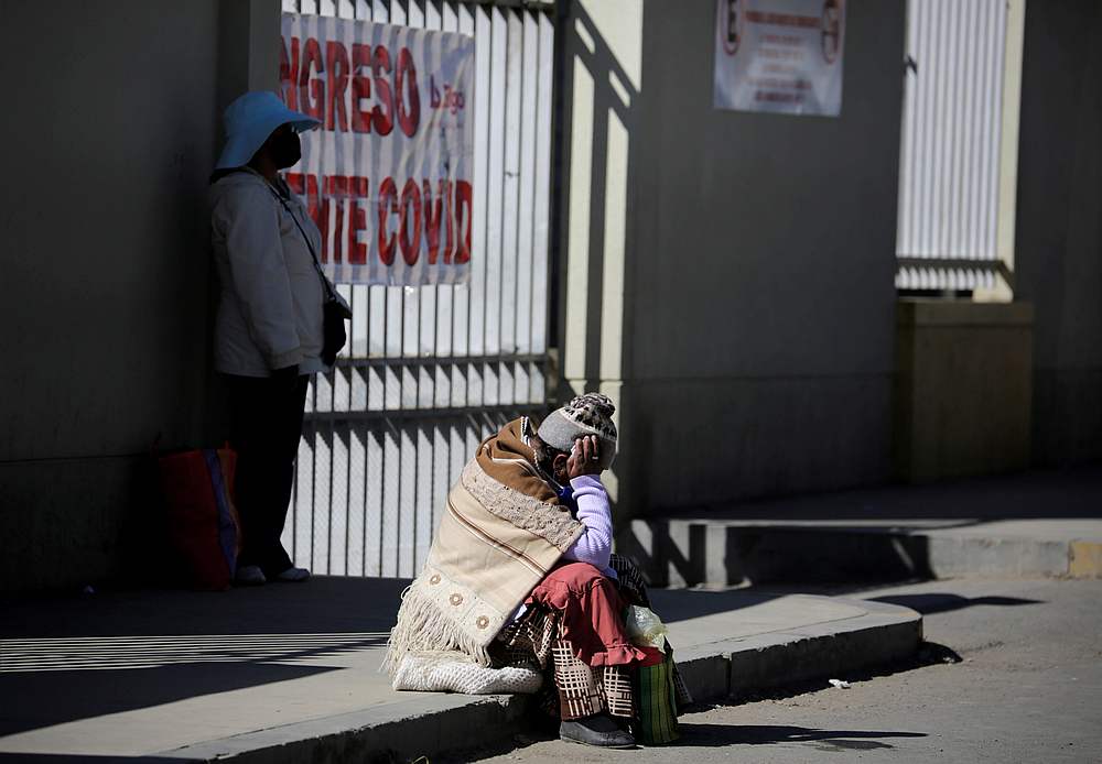 A woman who, according to a relative, is suspected of having Covid-19) sits outside El Norte Hospital, in El Alto outskirts of La Paz, Bolivia July 6, 2020. u00e2u20acu201d Reuters pic