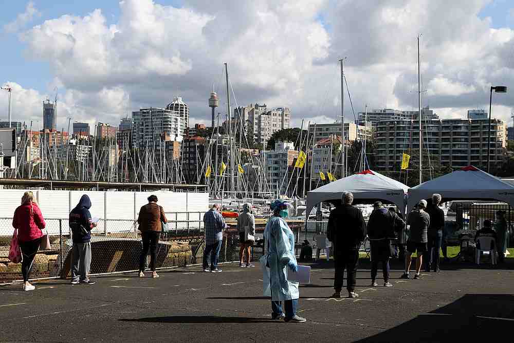 People maintain social distance as they queue to be tested for Covid-19 at a pop-up testing centre, as New South Wales grapples with an outbreak of new cases, in Sydney, Australia July 30, 2020. u00e2u20acu201d Reuters pic