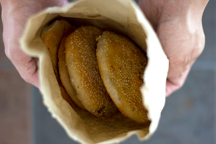 Charcoal-baked 'gong bian' biscuits in Sitiawan.