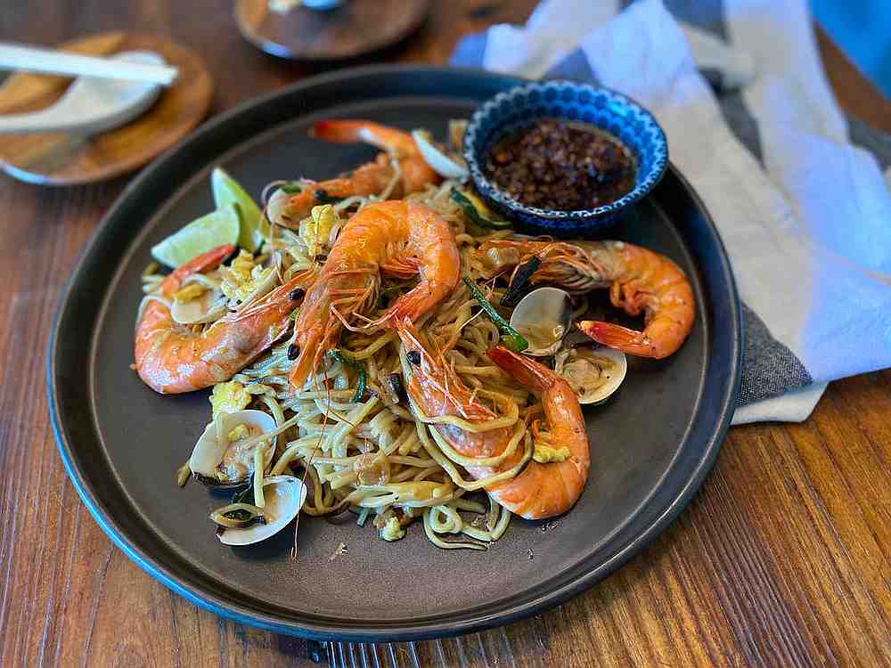 Damn Easy Hokkien Mee (pic) from Slake restaurant will be delivered to customers in vacuum-sealed packs for them to put together at home. u00e2u20acu201d Singapore Tourism Board pic via TODAY
