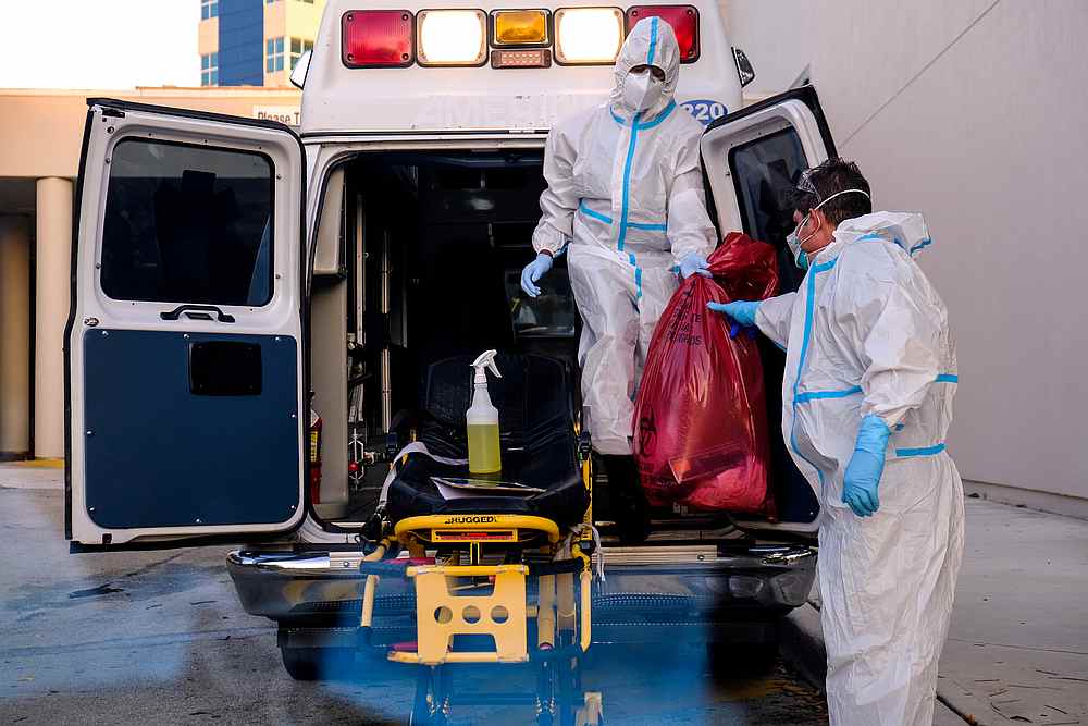 EMTs cleanse their materials outside Memorial West Hospital where Covid-19 patients are treated, in Pembroke Pines, Florida July 13, 2020. u00e2u20acu201d Reuters pic