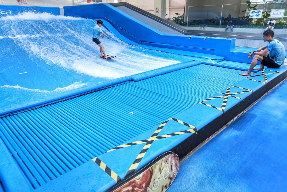 FlowRider, an indoor water surfing park located in the One Utama shopping complex, has reopened its doors to the public on July 1,2020. u00e2u20acu201d Picture by Ahmad Zamzahuri