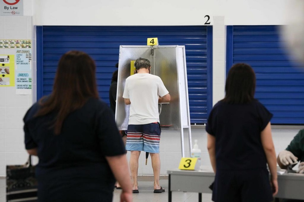 Voters casting their ballots at a polling station in Dunearn Secondary School on July 10, 2020. u00e2u20acu201d TODAY pic