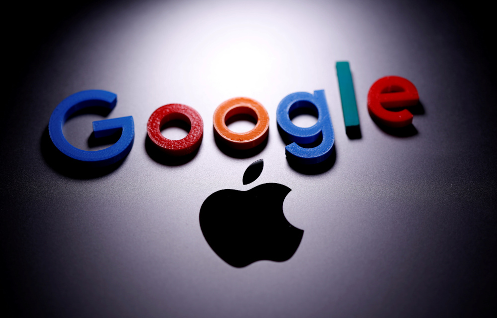 A 3D printed Google logo is placed on the Apple Macbook in this illustration taken April 12, 2020. u00e2u20acu201d Reuters pic 