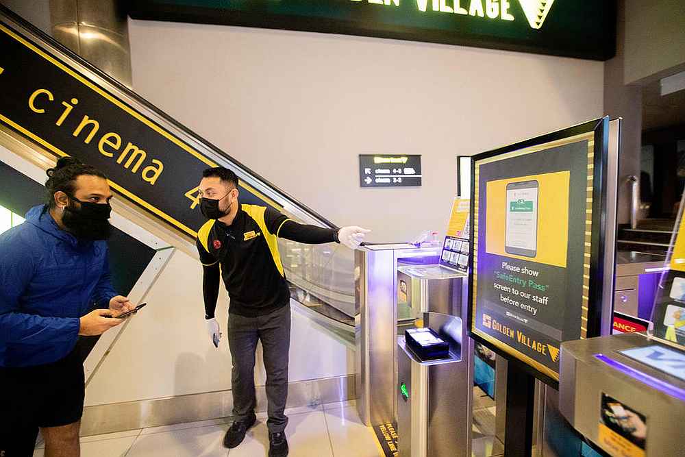 Movie-goers were required to scan their Safe Entry QR code before entering Golden Village cinema at Tampines Mall shopping centre on July 13, 2020. u00e2u20acu201d TODAY pic