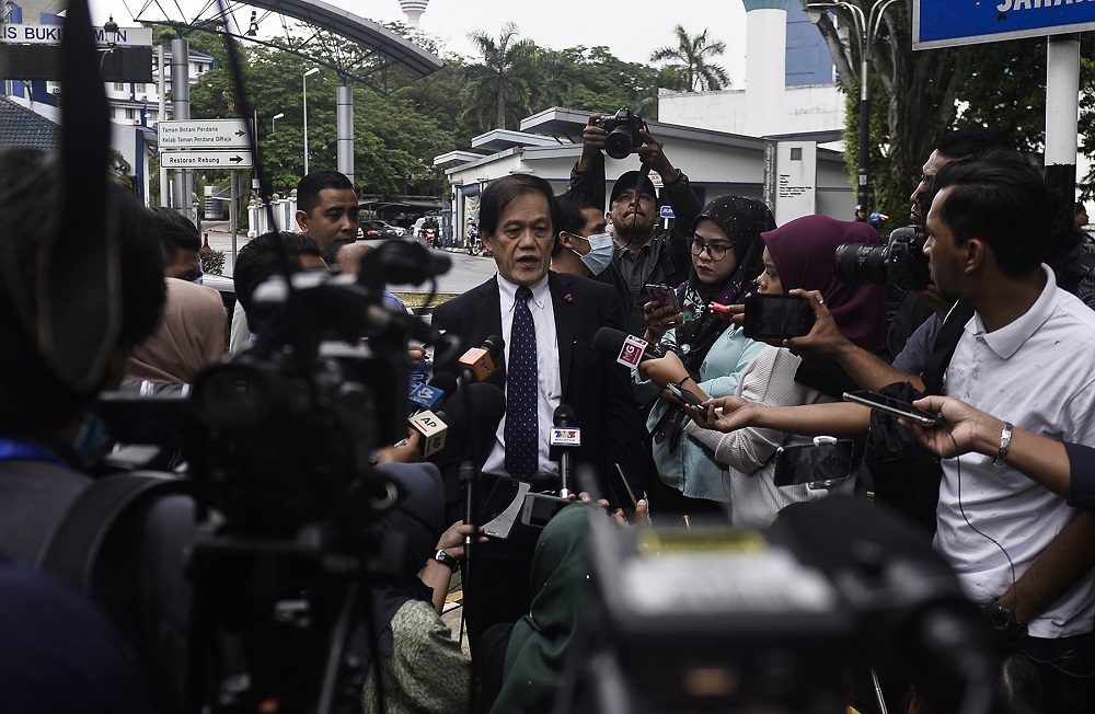 Al Jazeera lawyer Hisyam Teh Poh Teik speaks to reporters outside the Bukit Aman headquarters in Kuala Lumpur July 10, 2020. u00e2u20acu2022 Picture by Miera Zulyana