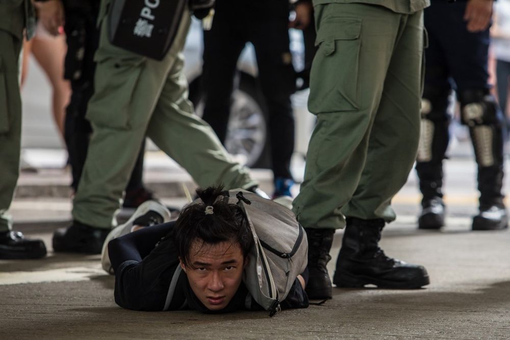 Riot police detain a man as they clear protesters taking part in a rally against a new national security law in Hong Kong on July 1, 2020, on the 23rd anniversary of the cityu00e2u20acu2122s handover from Britain to China. u00e2u20acu201d AFP pic