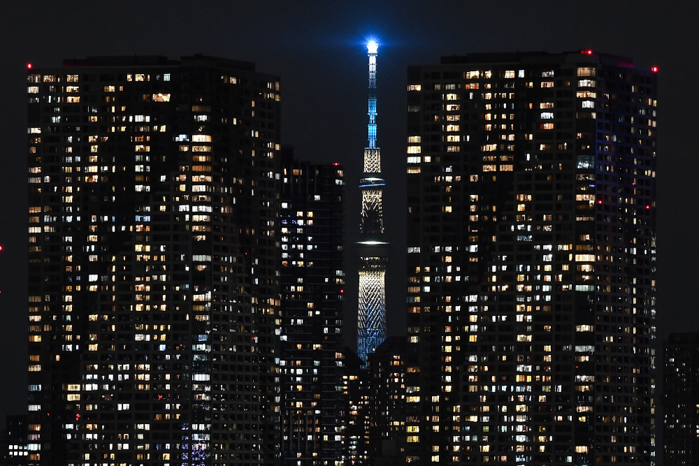This picture taken July 21, 2020 shows the landmark Tokyo Skytree (centre) at night in Tokyo. u00e2u20acu201d AFP pic 