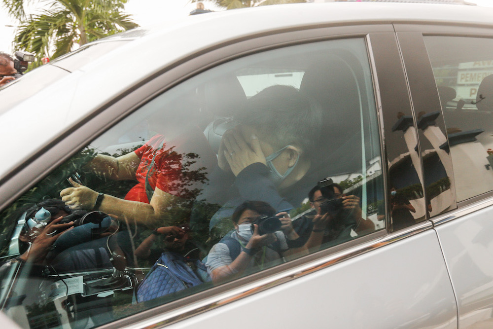 A vehicle believed to be transporting the family of Jeffrey Chew leaving the compound after Penang Port Commission Chief Jefferey Chew is arrested by the MACC at Bayan Baru Police Station July 1, 2020. u00e2u20acu201d Picture by Sayuti Zainudin
