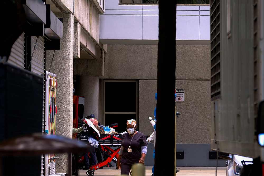 Emergency Medical Technicians arrive with a patient at Jackson Health Center, where Covid-19 patients are treated, in Miami, Florida July 14, 2020. u00e2u20acu201d Reuters pic