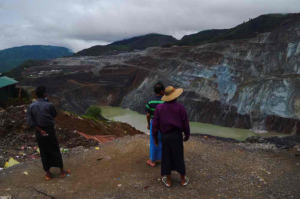 People stand in front of a jade mine following a landslide in Hpakant, Kachin State City, Myanmar July 4, 2020. u00e2u20acu201d Reuters pic