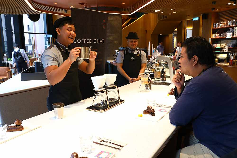 Luqman at the coffee chat session led by (from left) Syafiq Akmal and Remy Razali. u00e2u20acu201d Picture courtesy of Starbucks Malaysia