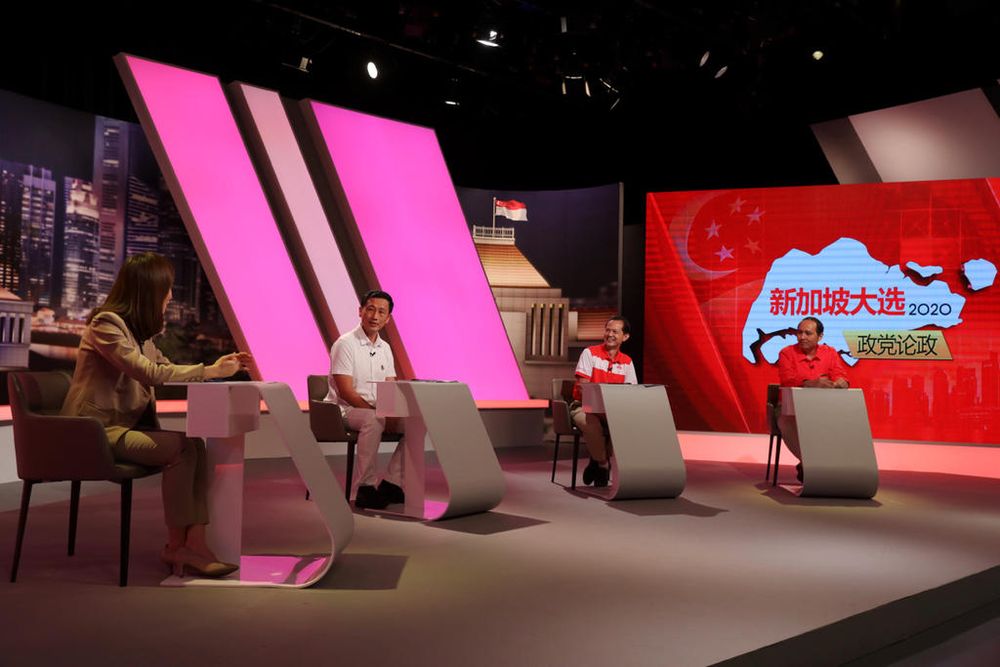 Taking part in a live televised Mandarin debate on July 1, 2020 during the Singapore General Election campaign were (from right) Bryan Lim, Leong Mun Wai and Ong Ye Kung. u00e2u20acu201d TODAY pic