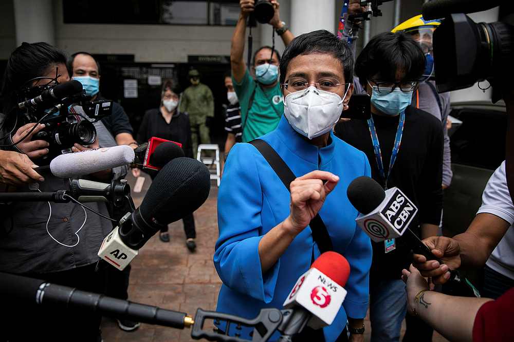 Rappler CEO and Executive Editor Maria Ressa leaves a regional trial court after pleading not guilty to tax evasion charges in Manila, Philippines July 22, 2020. u00e2u20acu201d Reuters pic