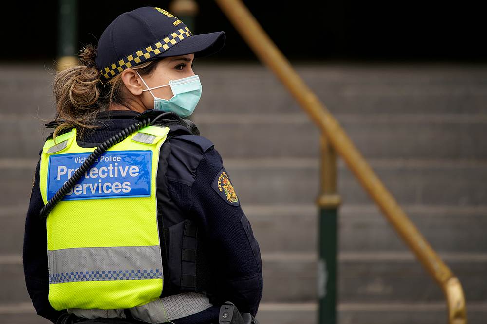 A Protective Services Officer wearing a face mask patrols Flinders Street station in Melbourne July 23, 2020. u00e2u20acu201d Reuters pic
