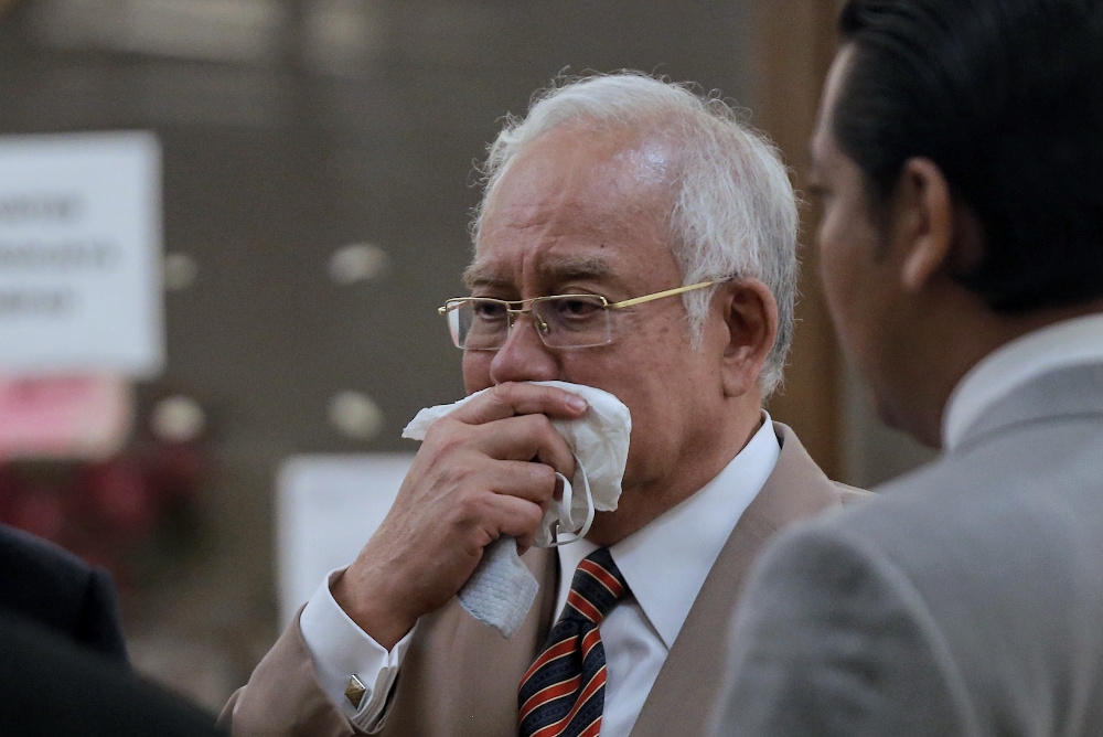 Datuk Seri Najib Razak is pictured at Kuala Lumpur High Court as he leaves the building July 28, 2020. u00e2u20acu201d Picture by Ahmad Zamzahuri