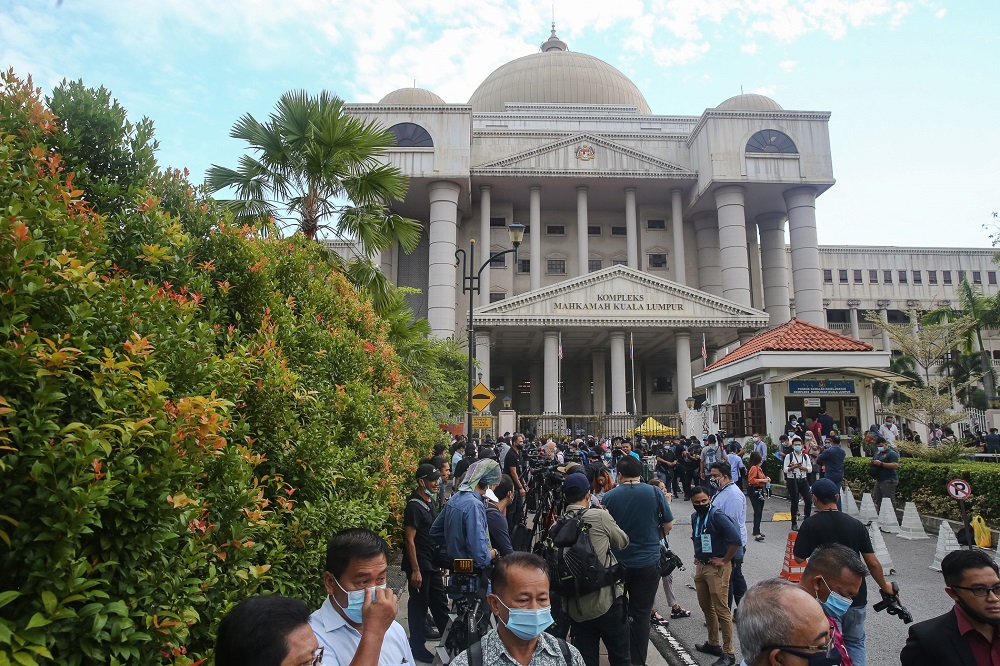 Members of the media waiting outside the Kuala Lumpur High Court Complex July 28, 2020. 