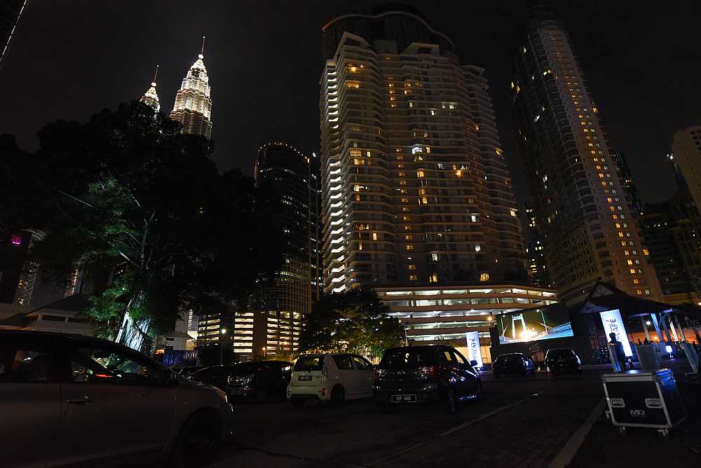 Located in the heart of Kuala Lumpur, the Nescafe M-Junction Drive-In Cinema offers attendees the beautiful view of KLCC and KL Tower in their space. — Picture by Arif Zikri