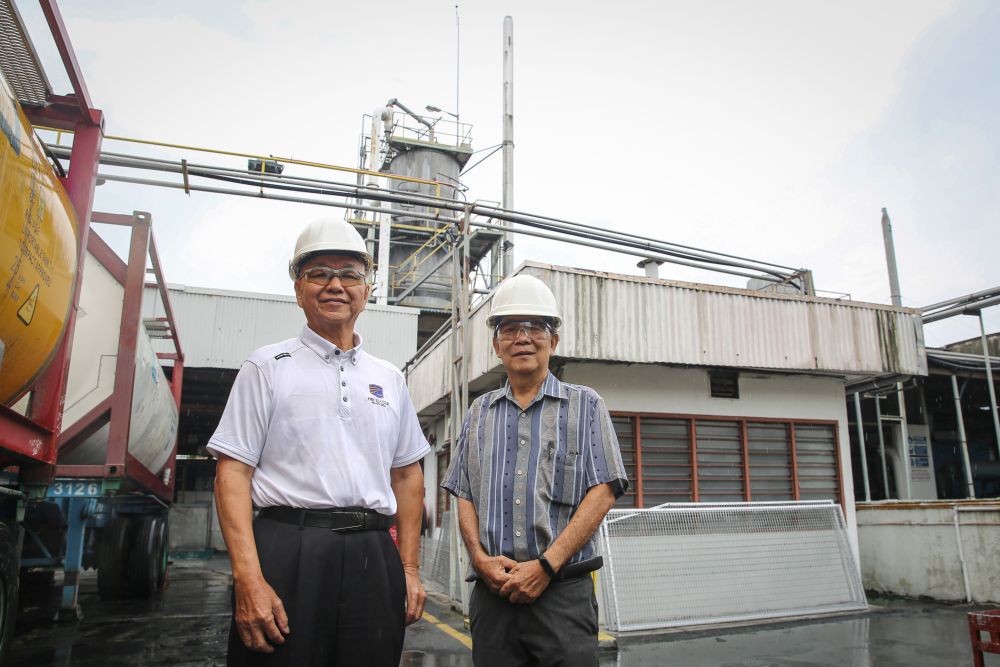 Nylex Specialty Chemicals Sdn Bhd works manager David KS Ng (left) and commercial services Kam Swee Khow pose for a picture after an interview with Malay Mail in Klang July 14, 2020. u00e2u20acu201d Picture by Yusof Mat Isa